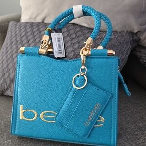 Bebe Turquoise Mini Bag with Gold Details And Crossbody Strap.